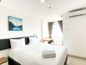 Minimalist Studio at Enviro Apartment By Travelio